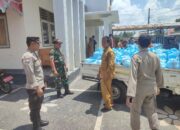 Bhabinkamtibmas dan Babinsa Desa Paokmotong Monitoring Distribusi Sembako dari Pemkab Lotim